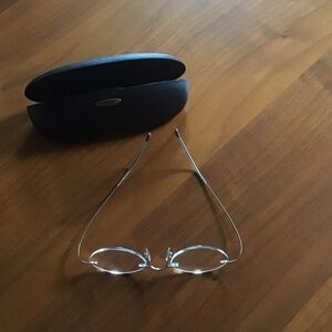 Silhouette rimless, hingeless titanium glasses in a copper color -- with case